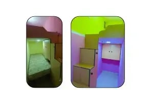 Loft=type room with purple neon lights.